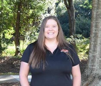 Female employee smiling at camera