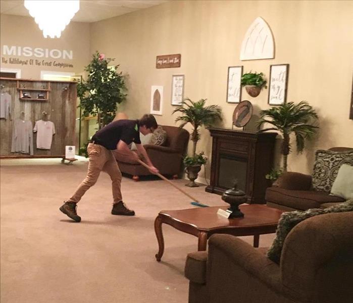 our team member Devin “raking” product into carpet fibers for a commercial carpet cleaning.