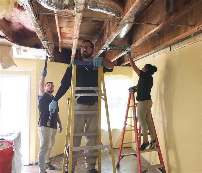 Removing ceiling due to water damage from above unit